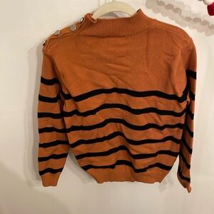 Orange and black striped Amazon sweater